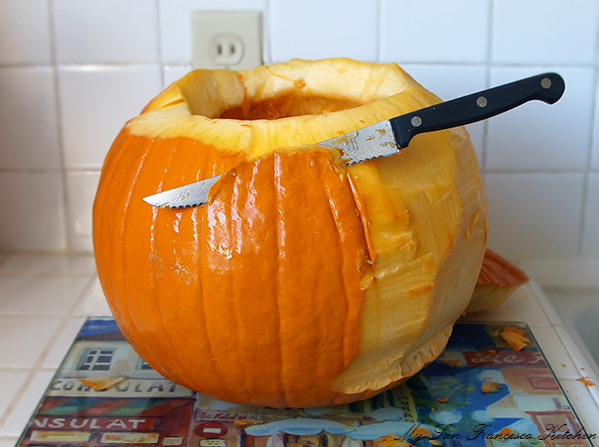 cutting pumpkin